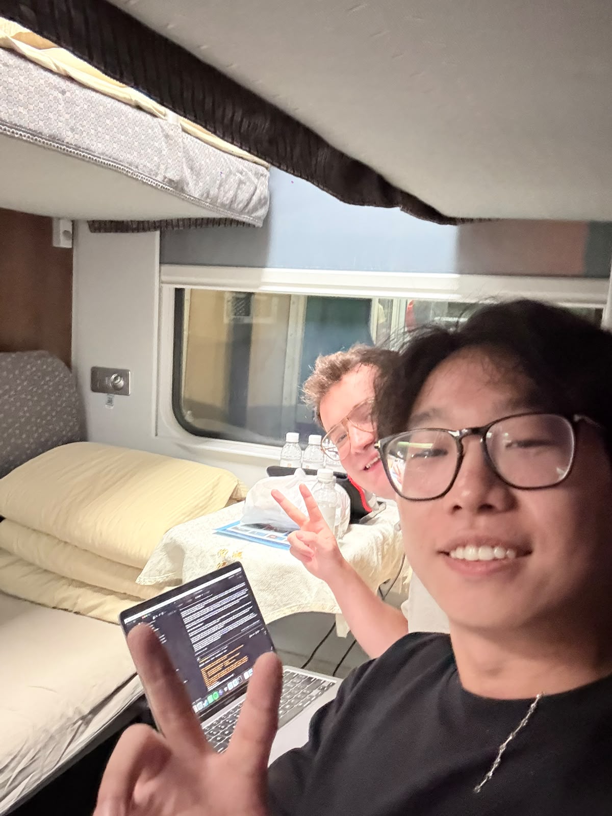 Yushu and Nick building the Casa app on a bullet train through Asia